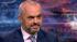 Albanian PM kneels to greet Italian PM Meloni -
