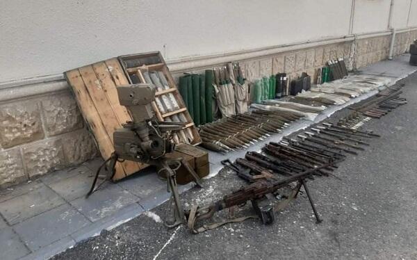 7 more automatic weapons and 6 grenades were found