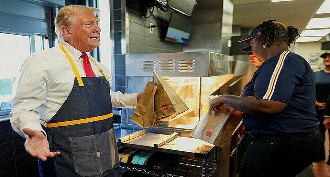 Trump tries out as McDonald's chef