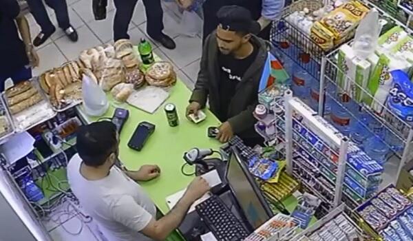 Əcnəbilərin Bakıda mağazada dələduzluğu şok etdi - Video